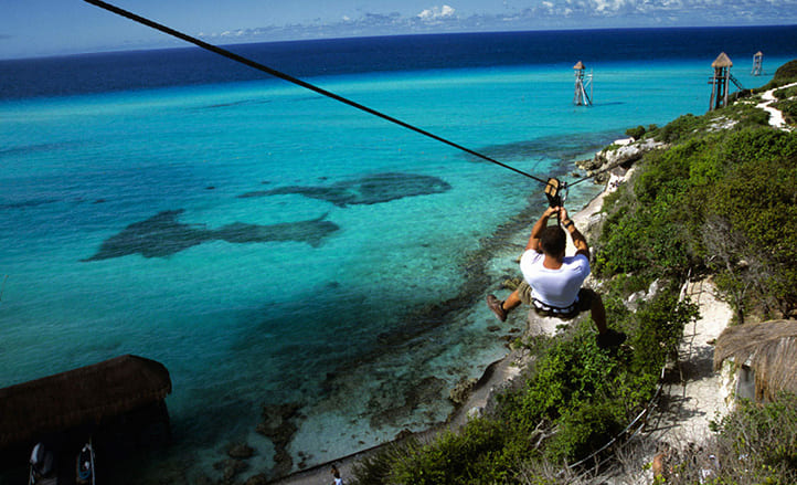 zipline in Isla Mujeres looking at Caribbean Ocean