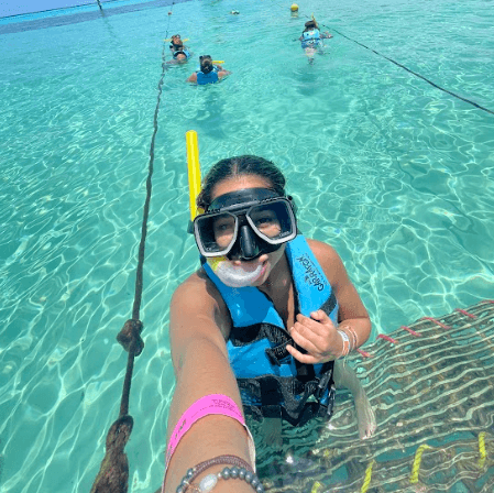 girl snorkeling on Isla Mujeres